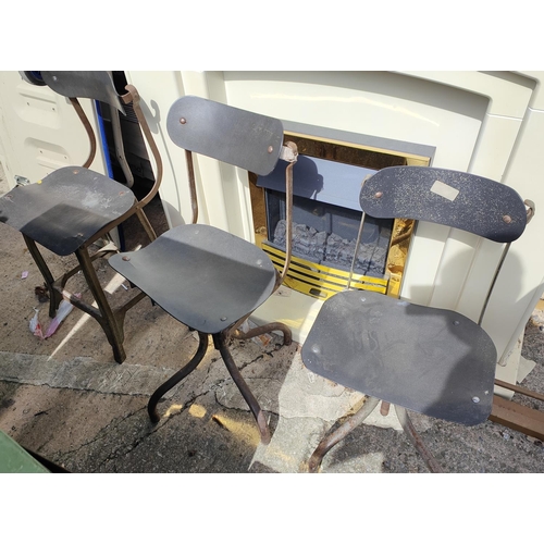 963A - Two Industrial vintage early 20th century adjustable machinist chairs, by Evertaut ; a fixed height ... 