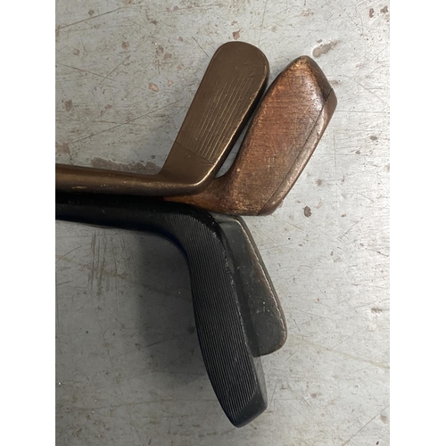 137 - 4 unusual vintage golf clubs inc. two double sided clubs