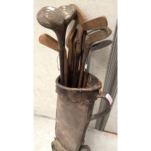 137C - A collection of antique golf clubs