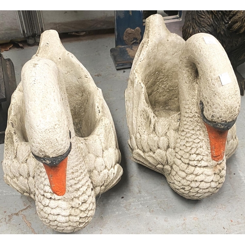 156 - A pair of garden planters in the form of swans