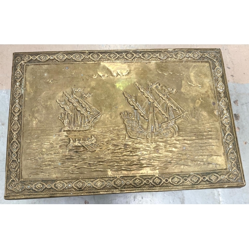 75A - An embossed brass log box; a brass bull dog; a brass horse & jockey, heavy door knocker, present... 