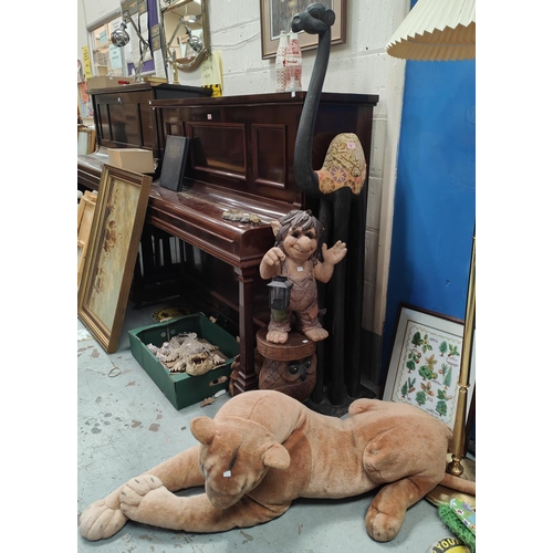 56 - A tall carved figure of a camel; a large lion soft toy and other animals etc.