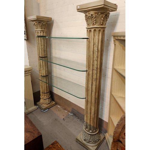 65 - A 5 height display unit formed from two classical columns and 4 glass shelves 