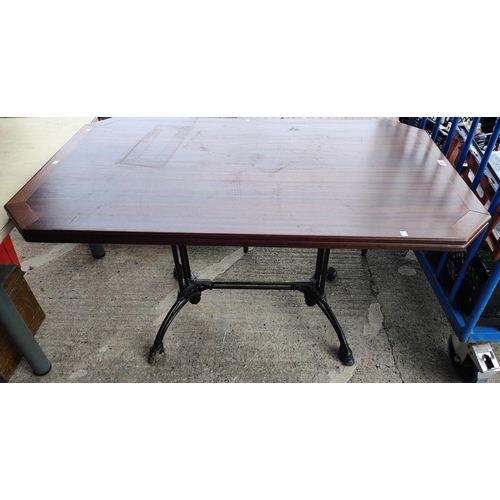 960 - A cast iron based kitchen/pub table of good size.