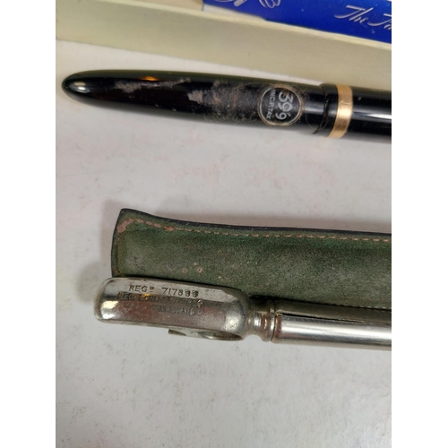 126 - A vintage Parker and a vintage Swan fountain pen, other pens/silver pencils.