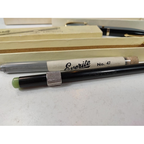 126 - A vintage Parker and a vintage Swan fountain pen, other pens/silver pencils.