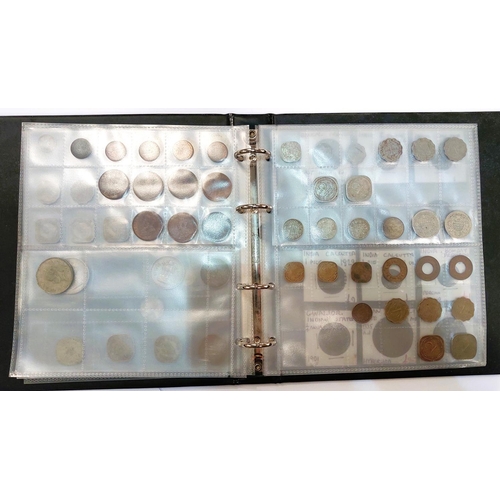 226 - An album of Indian coins 19th/20th century inc. many silver examples