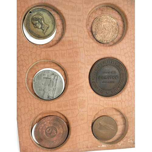 236 - A collection of coins, medallions and tokens on trays 