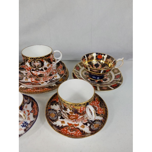 536 - 2 Royal Crown Derby trio sets, 2 loving cups and two cups and saucers, various designs.