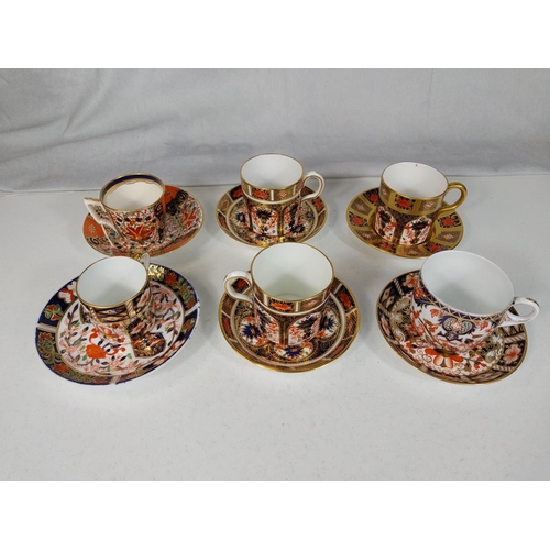 537 - 6 Royal crown Derby Imari pattern coffee cups and saucers (various designs).