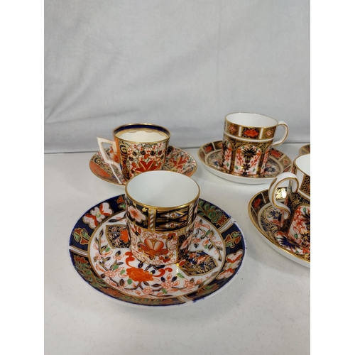 537 - 6 Royal crown Derby Imari pattern coffee cups and saucers (various designs).