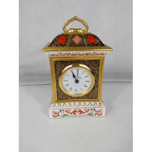 540 - A Royal Crown Derby mantle clock, height 19 cm.