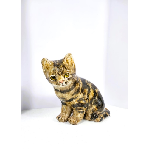 559 - A Winstanley cat, glass eyes, in seated position, signed, size 3