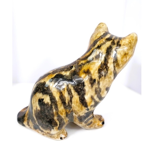 559 - A Winstanley cat, glass eyes, in seated position, signed, size 3