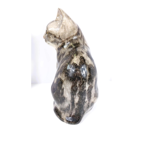 562 - A Winstanley cat, glass eyes, seated, size 4