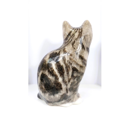 562 - A Winstanley cat, glass eyes, seated, size 4