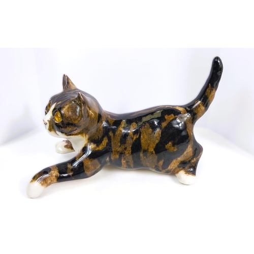 563 - 2 Winstanley cats, glass eyes, one playing, one lying down, size 3, signed (one paw a.f. but present... 