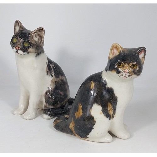 564 - 2 Winstanley cats, glass eyes, both seated, 1 x size 2, 1 x size 3, both signed.