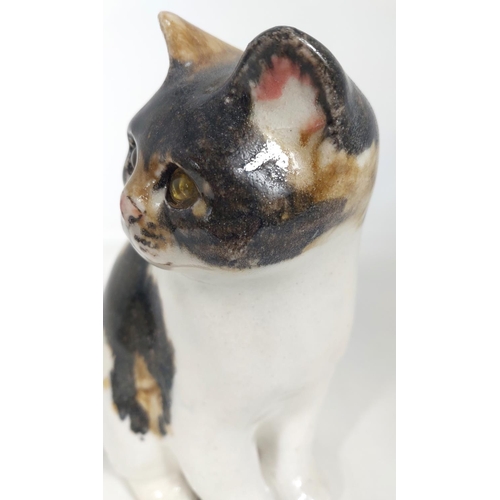 564 - 2 Winstanley cats, glass eyes, both seated, 1 x size 2, 1 x size 3, both signed.