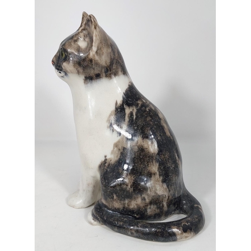 564 - 2 Winstanley cats, glass eyes, both seated, 1 x size 2, 1 x size 3, both signed.