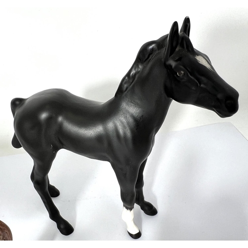 602 - A Beswick matt Black Beauty and foal, a Beswick Donkey and foal and 2 other Beswick horses