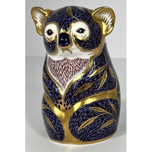 617 - A Royal Crown Derby paperweight Koala LIV, a rabbit LV, a rabbit LVI, all with stoppers