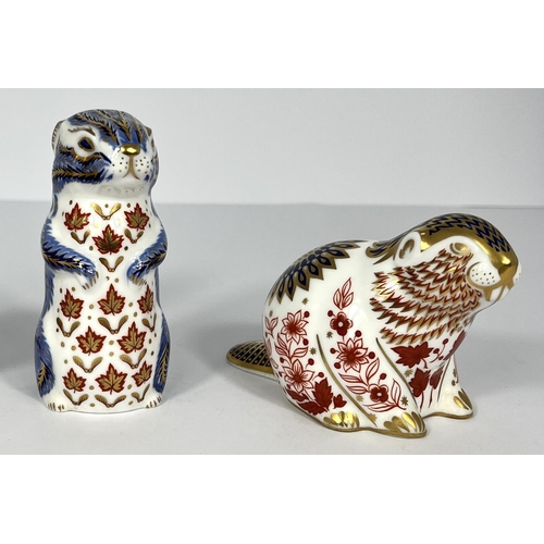 618 - A Royal Crown Derby cat paperweight, a similar chipmunk and a beaver