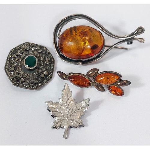 660 - 7 brooches to include 2 modern amber and silver, a blue enamel pansy, a blue enamelled orchid stampe... 