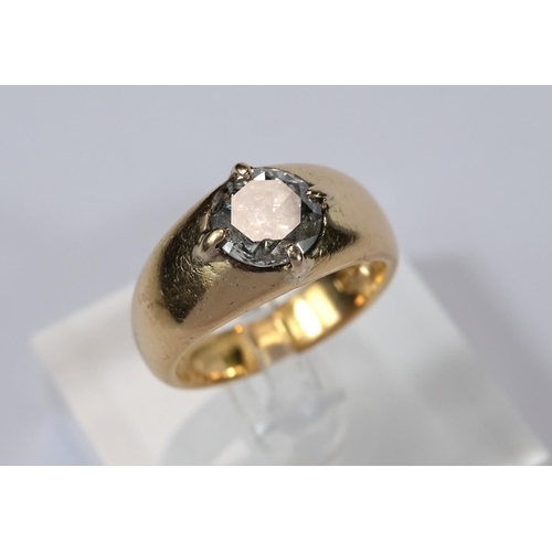 667 - A heavy 18 carat hallmarked gold dress ring with broad shank set large circular diamond, diameter ap... 