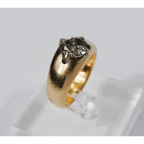 667 - A heavy 18 carat hallmarked gold dress ring with broad shank set large circular diamond, diameter ap... 