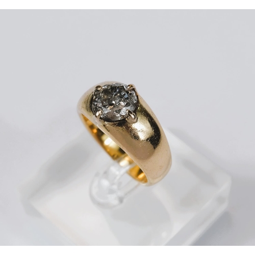 667 - A heavy 18 carat hallmarked gold dress ring with broad shank set large circular diamond, diameter ap... 