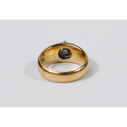 667 - A heavy 18 carat hallmarked gold dress ring with broad shank set large circular diamond, diameter ap... 