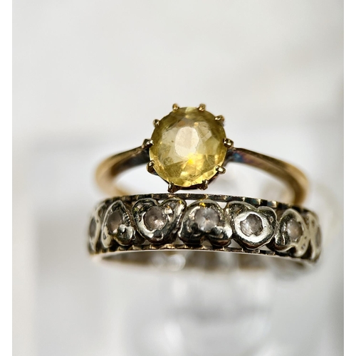 681 - A Victorian child size ring with unmarked yellow metal shank with 5 old cut diamonds in ornate split... 