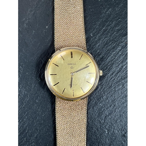 696 - An Omega 9ct gold manual Wind de Ville wristwatch with Omega 9ct gold closed mesh bracelet with Omeg... 