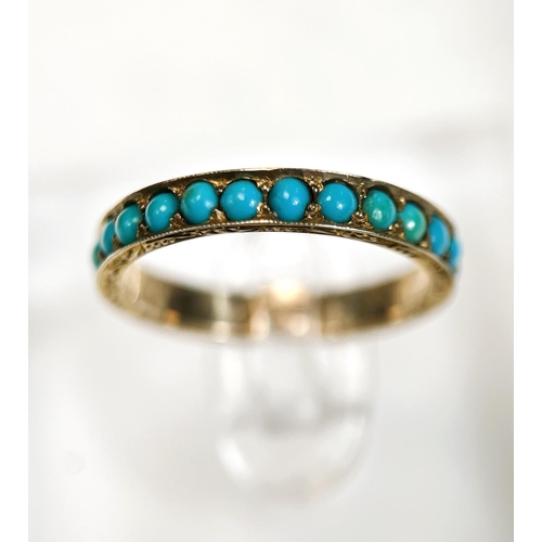 702 - A VICTORIAN ETERNITY RING, 9ct gold, set turquoise beads, chased decoration. size N