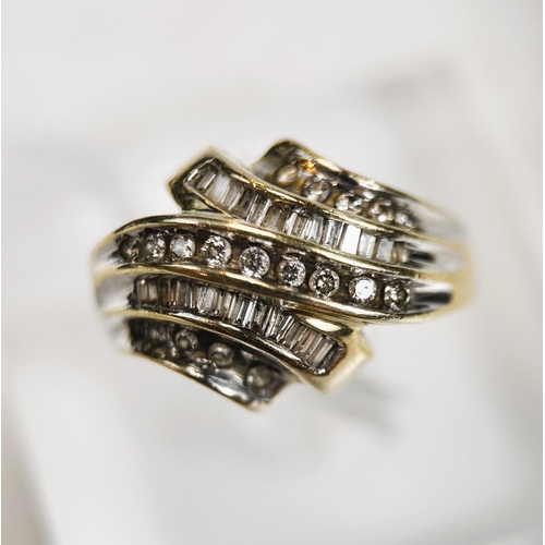 726 - A yellow metal dress ring stamped 10K, set with 5 alternating, rows of circular and square cut diamo... 