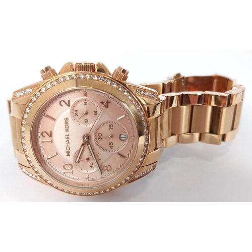 730 - A Michael Kors Blair Chronograph watch, rose gold colour with diamante bezel, original box, no MK526... 