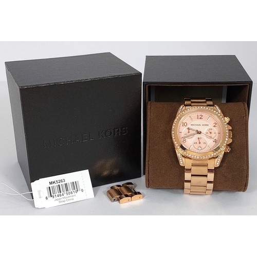 730 - A Michael Kors Blair Chronograph watch, rose gold colour with diamante bezel, original box, no MK526... 