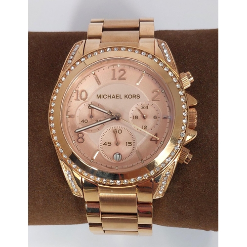 730 - A Michael Kors Blair Chronograph watch, rose gold colour with diamante bezel, original box, no MK526... 