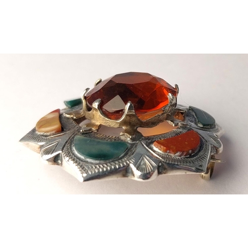 783 - A 19th century Scottish citrine brooch set coloured agates