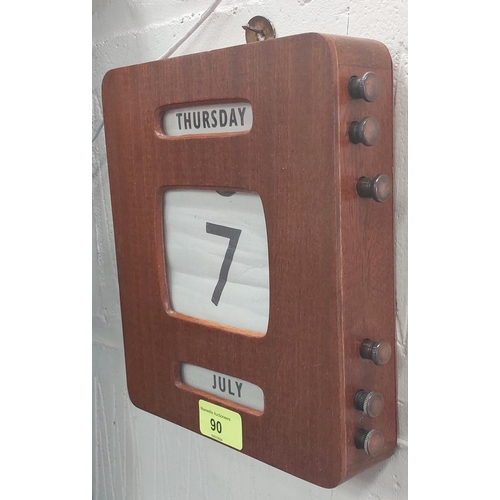 90 - A mid century sapele cased office perpetual calendar, 21 x 20cm