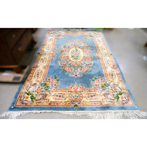 934 - A large blue ground Chinese carpet, 2.8m x 1.82m