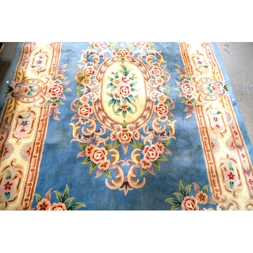 934 - A large blue ground Chinese carpet, 2.8m x 1.82m