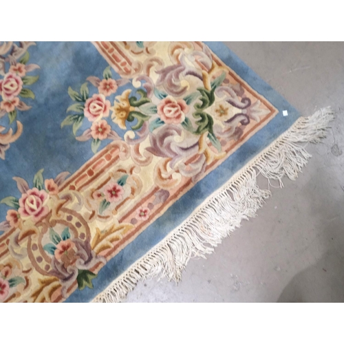 934 - A large blue ground Chinese carpet, 2.8m x 1.82m