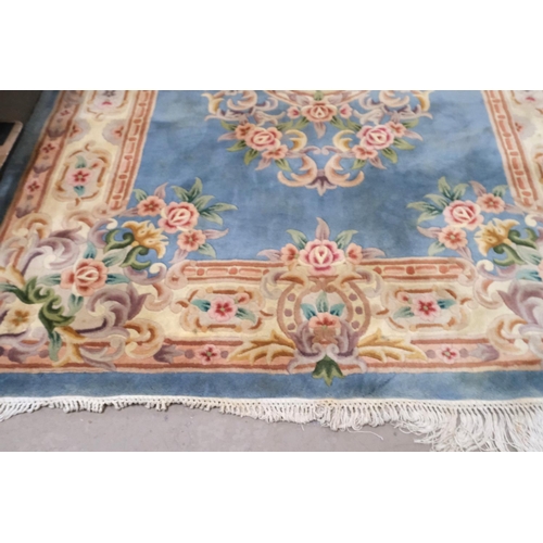 934 - A large blue ground Chinese carpet, 2.8m x 1.82m