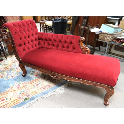 962 - A Victorian style chaise longue on cabriole legs, upholstered in red.