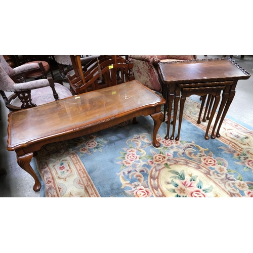 972 - A rectangular figural mahogany coffee table and a similar nest of tables.