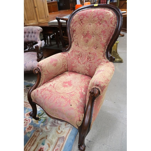 973 - A Victorian spoon back occasional chair in deep pink brocade and a similar footstool.