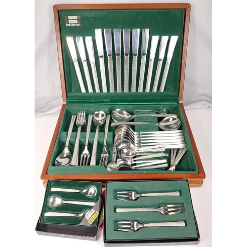 664 - A Viners Studio 6 setting canteen of stainless steel  cutlery with bark effect handles in fitte... 