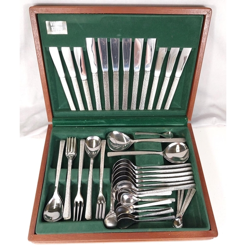 664 - A Viners Studio 6 setting canteen of stainless steel  cutlery with bark effect handles in fitte... 